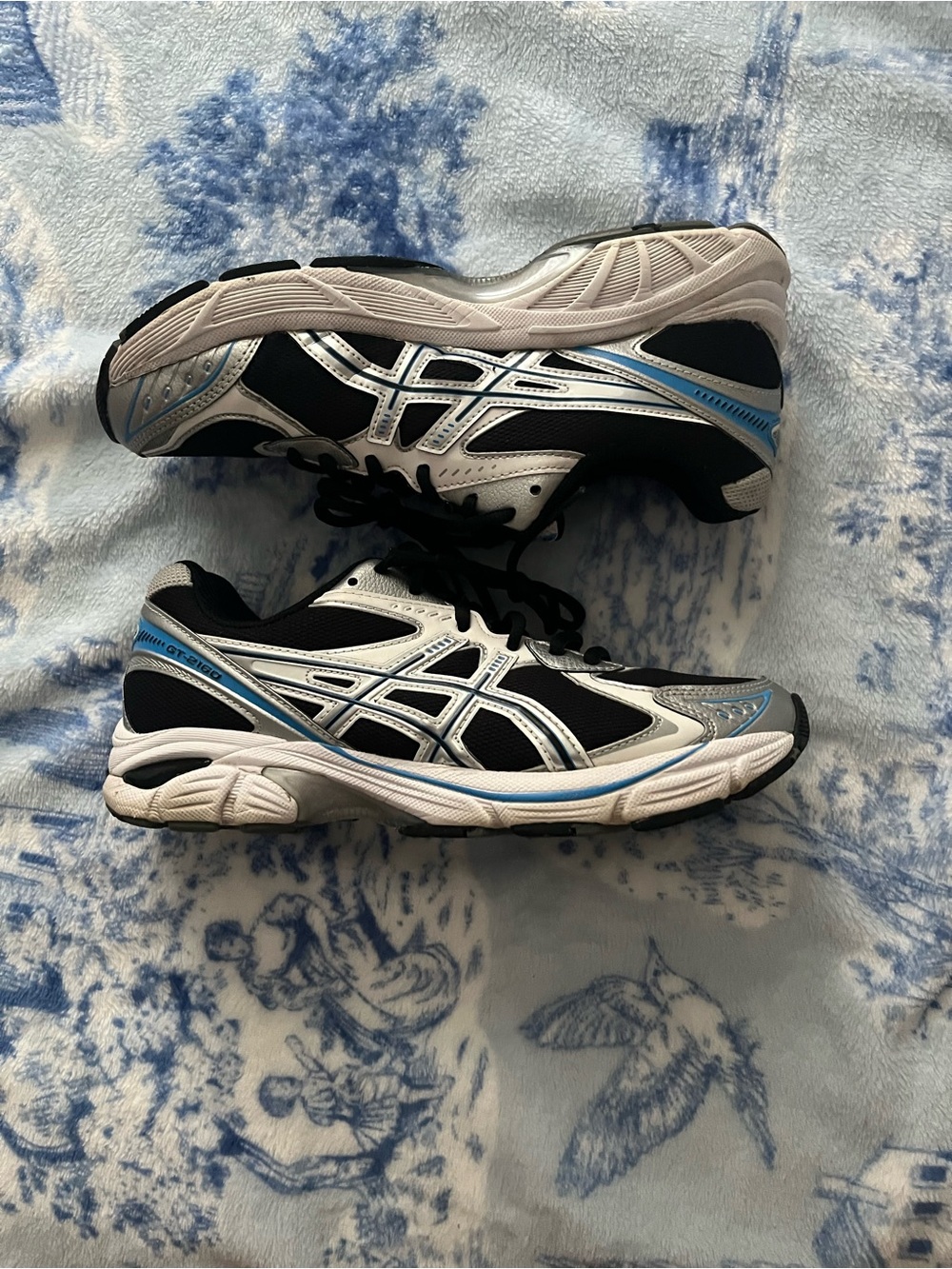Asics Black Sneakers with Silver Detailing